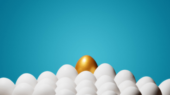 A single golden egg amongst a lot of plain eggs